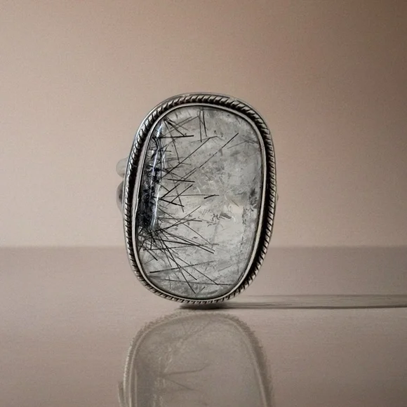 This piece is a black rutilated quartz ring set in sterling silver. Size 8 - Picture 5 of 6